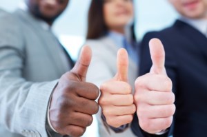 close-up-executives-showing-thumbs-up_1098-1828